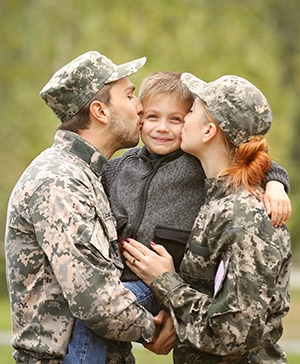 Military family reunited on a sunny day